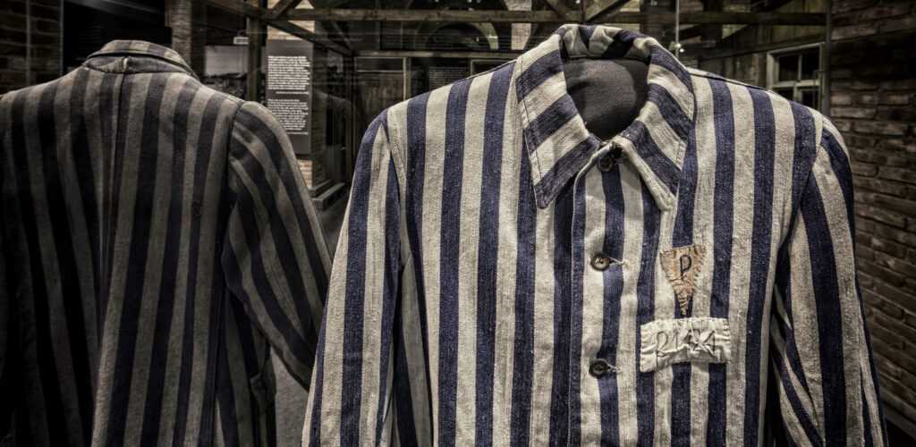 Uniform worn by Marian Kostuch. Uniform worn by Marian Kostuch, held as a Polish political prisoner. Kostuch was born on June 8, 1922, in Bieżanów. His occupation was listed in camp records as “tanner.”